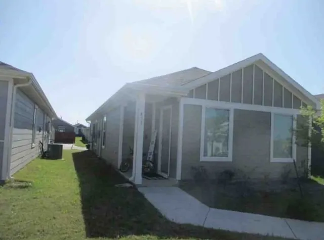 a view of backyard of house