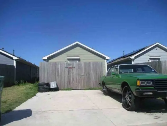 a front view of a house with garage