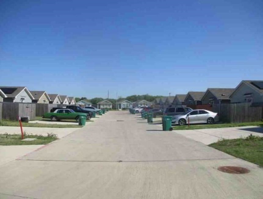 471 Reverie Way Ferris, TX 75125 - Photo 5 of 5 a view of river and houses with outdoor space