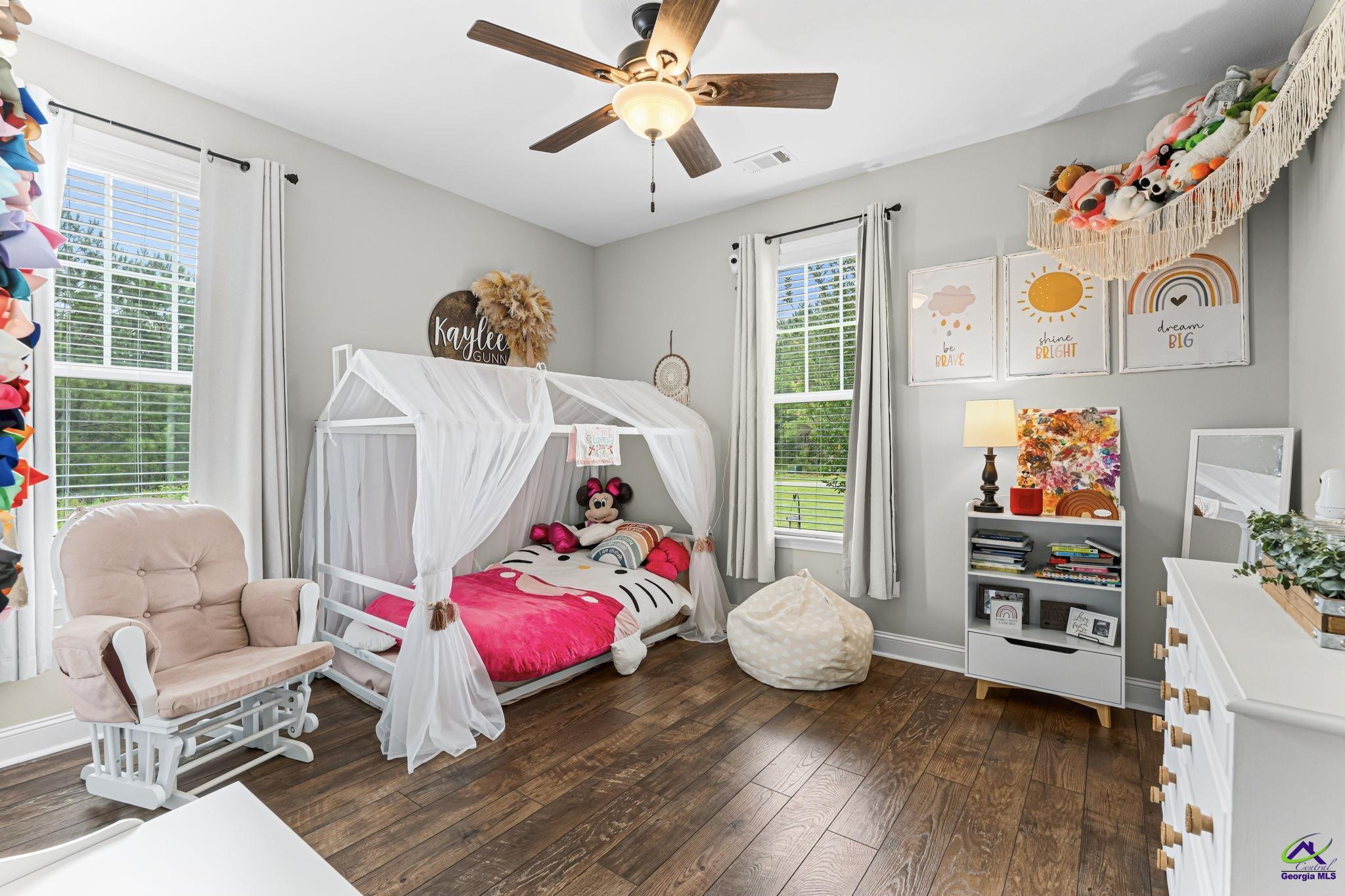 180 Woodland Trail Road Cochran, GA 31014 - Photo 19 of 25 a bedroom with toys and a wooden floor