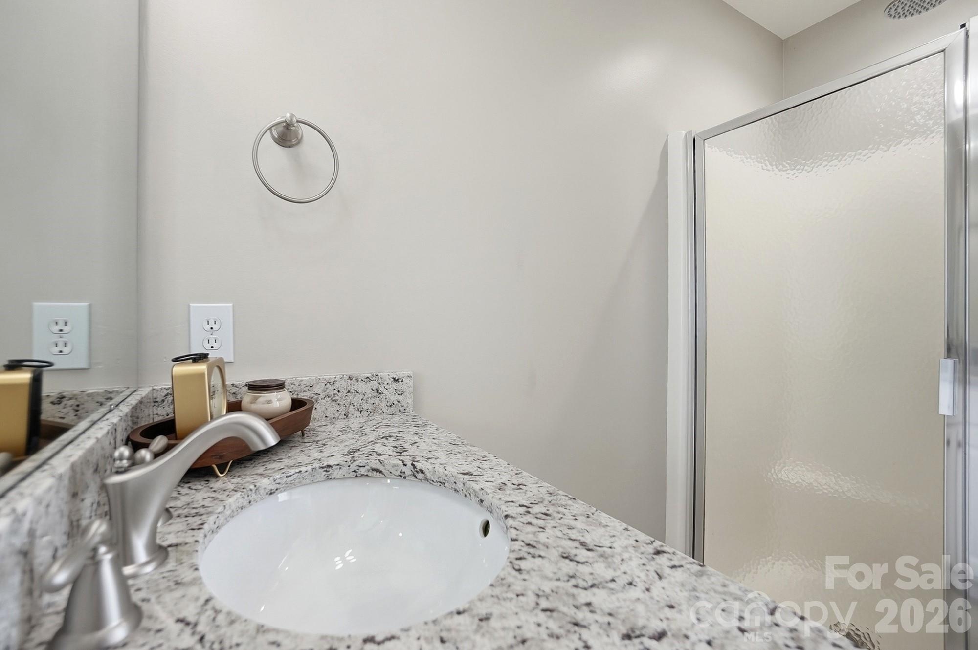 3324 Muddy Creek Road Midland, NC 28107 - Photo 30 of 46 a bathroom with a sink and a mirror