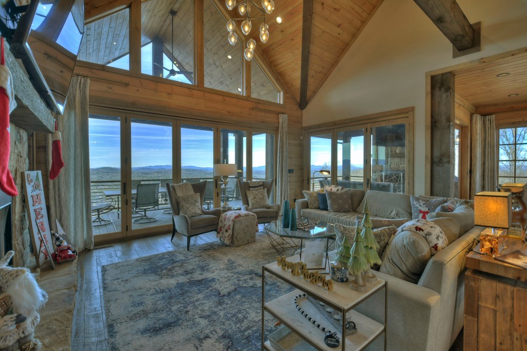 472 Overlook Drive Blue Ridge, GA 30513 - Photo 13 of 70 a living room with furniture and a large window