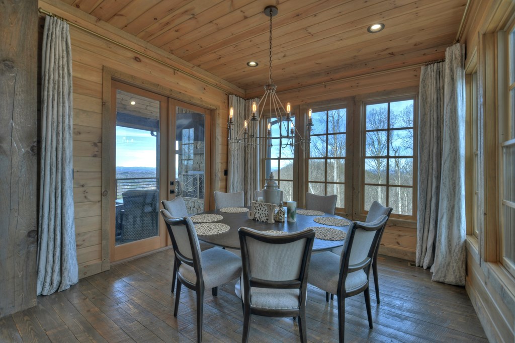 472 Overlook Drive Blue Ridge, GA 30513 - Photo 20 of 70 a view of a dining room with furniture window and wooden floor