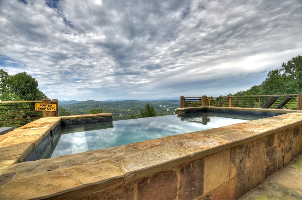 472 Overlook Drive Blue Ridge, GA 30513 - Photo 3 of 70 a view of a swimming pool with an outdoor seating
