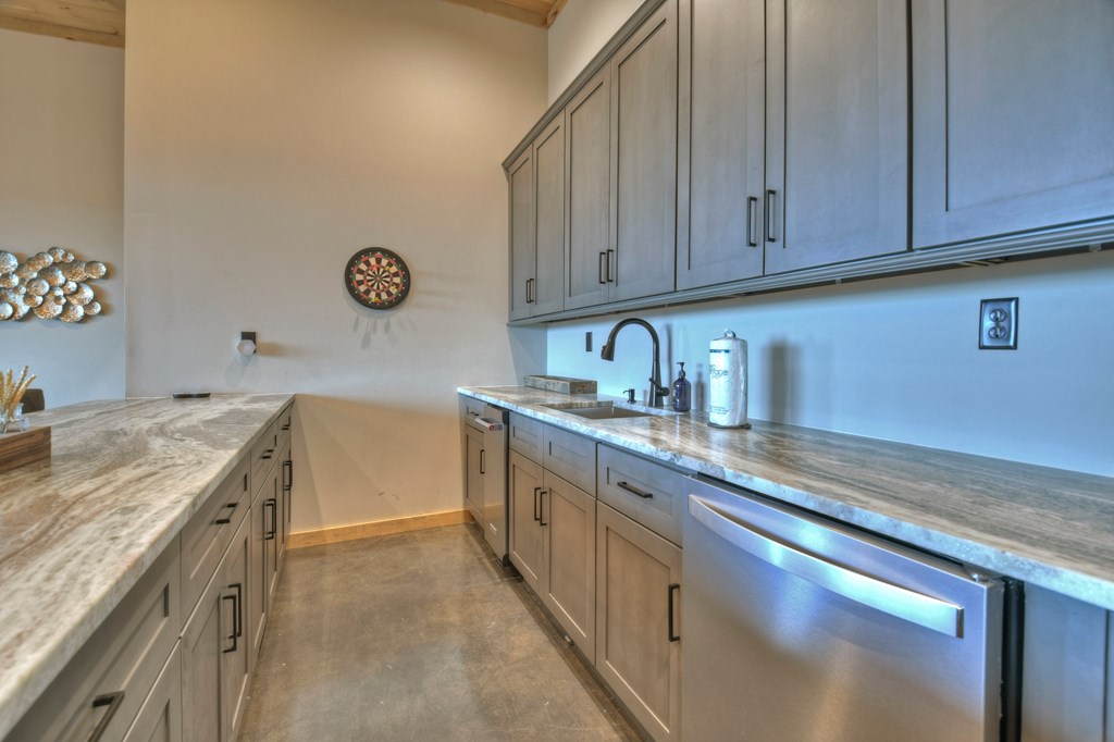 472 Overlook Drive Blue Ridge, GA 30513 - Photo 43 of 70 a kitchen with a sink and cabinets