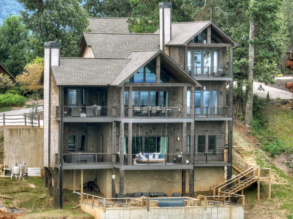 472 Overlook Drive Blue Ridge, GA 30513 - Photo 62 of 70 a view of a building with a large window and a table and chairs