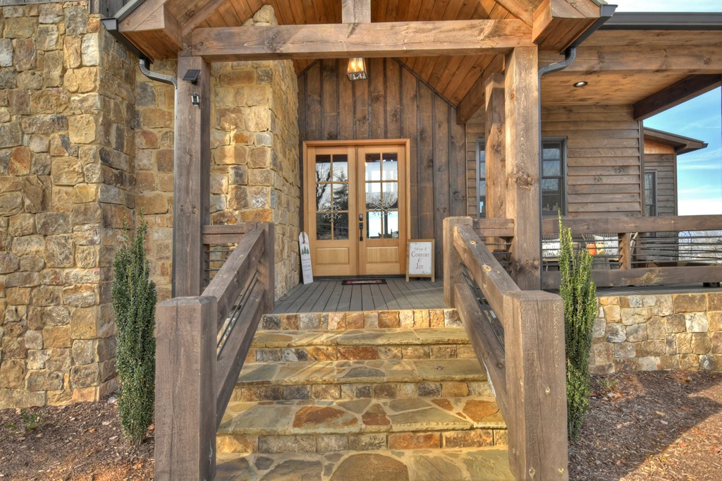 472 Overlook Drive Blue Ridge, GA 30513 - Photo 9 of 70 a view of a balcony with a furniture and floor to ceiling window