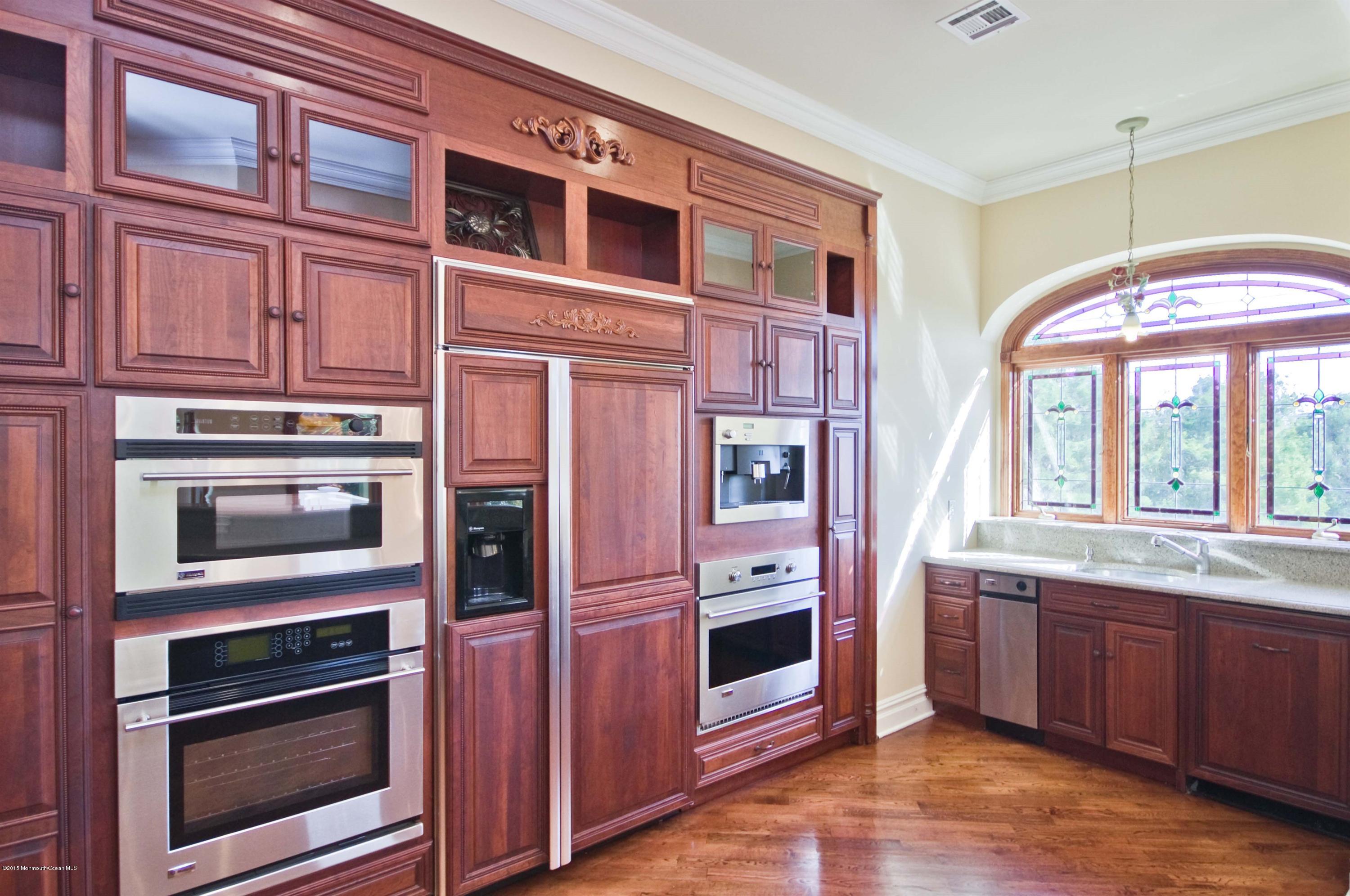 81 Potts Road Robbinsville, NJ 08691 - Photo 10 of 37 a kitchen with stainless steel appliances granite countertop a stove and a microwave