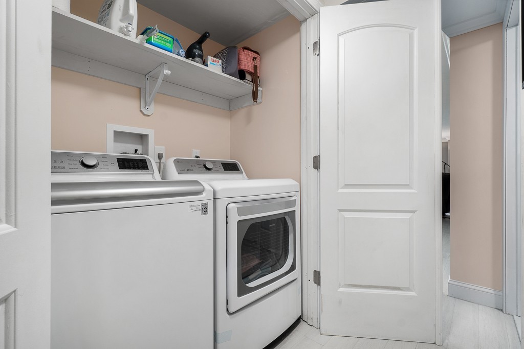 10 Riverbank Road, Unit 3 Maynard, MA 01754 - Photo 14 of 20 a utility room with dryer and washer