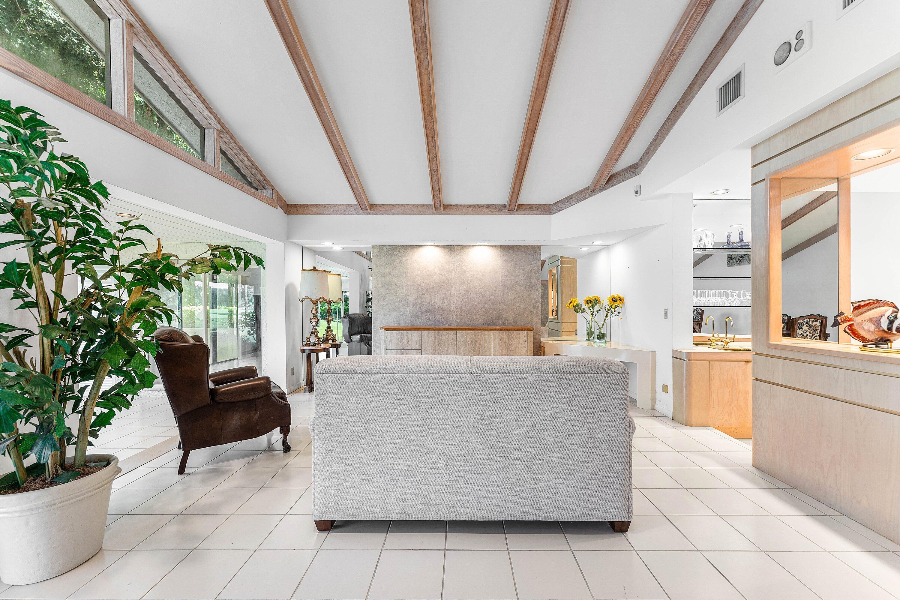 30 Hampshire Lane Boynton Beach, FL 33436 - Photo 13 of 84 a living room with furniture and a potted plant