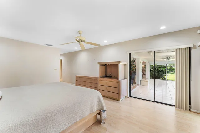 a view of a swimming pool with a garden