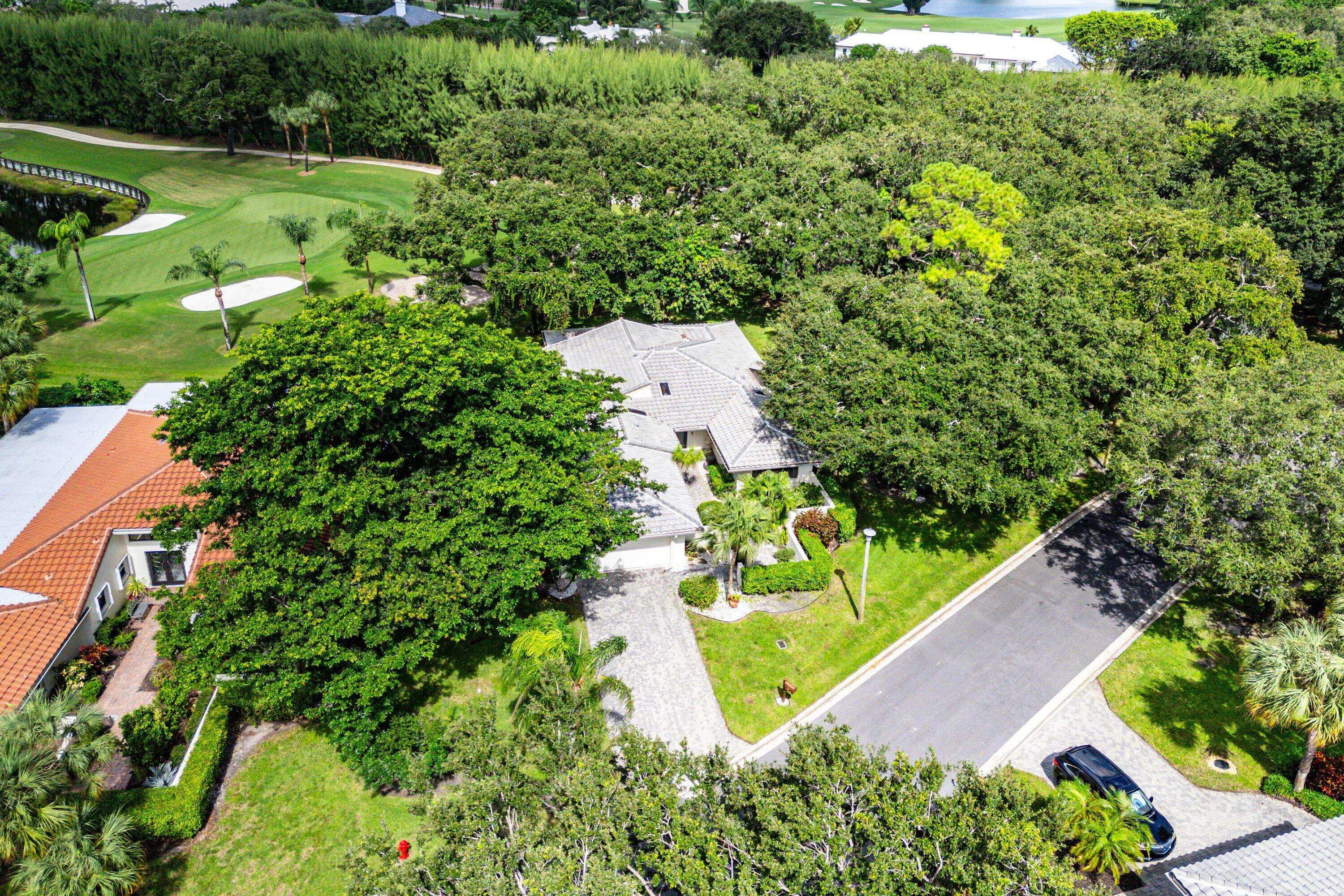 30 Hampshire Lane Boynton Beach, FL 33436 - Photo 52 of 84 an aerial view of a house with a yard and outdoor seating
