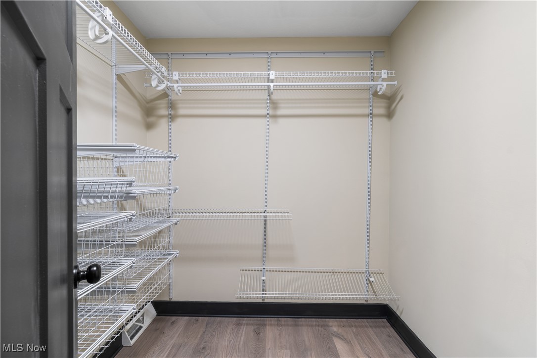 2201 Ridgewood Road Medina, OH 44256 - Photo 30 of 50 Spacious closet featuring dark wood-type flooring