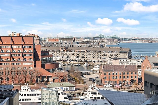a view of a city with tall buildings