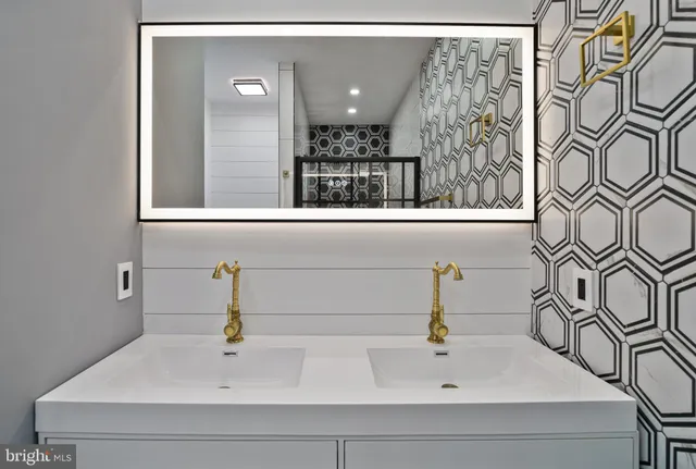 a bathroom with a toilet and a shower curtain