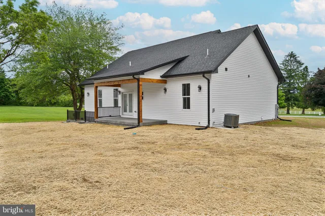 a view of garage and yard