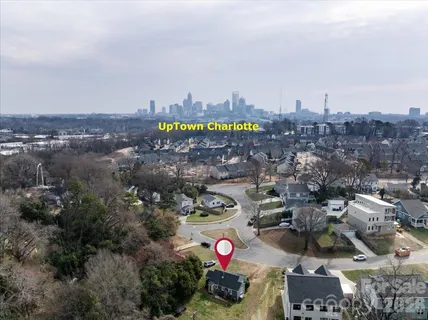 a view of a backyard with plants and patio