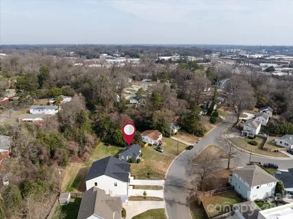 an aerial view of residential house with outdoor space