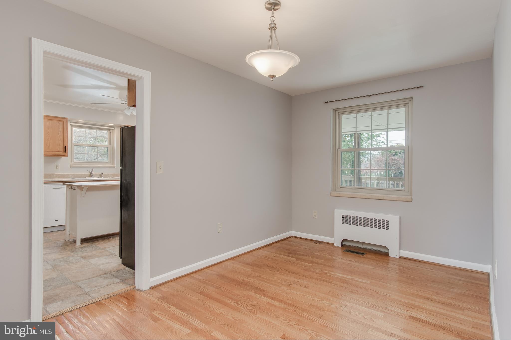 619 Biggs Avenue Frederick, MD 21702 - Photo 9 of 39 1st floor apartment dining room Pic 2