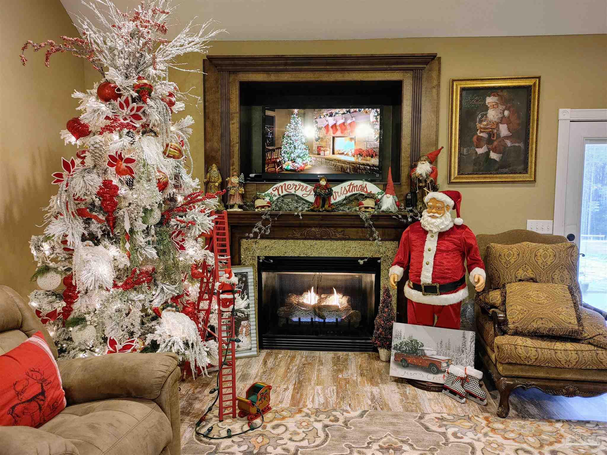 415 Clark Road Gilbertown, AL 36908 - Photo 3 of 50 a living room with furniture and a fireplace