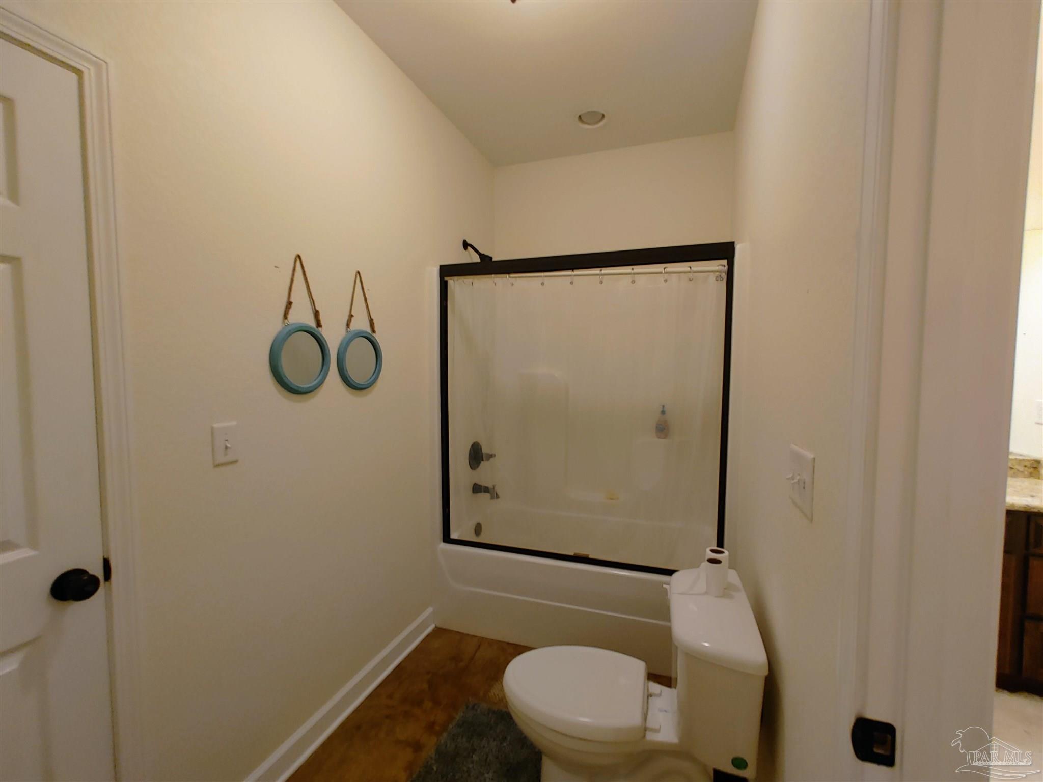 415 Clark Road Gilbertown, AL 36908 - Photo 23 of 50 a bathroom with a toilet and a shower