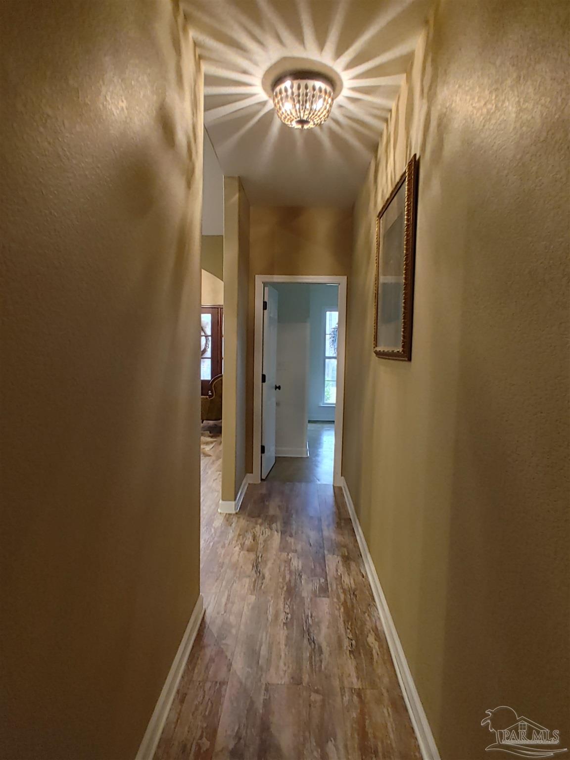 415 Clark Road Gilbertown, AL 36908 - Photo 24 of 50 a view of a hallway with wooden floor