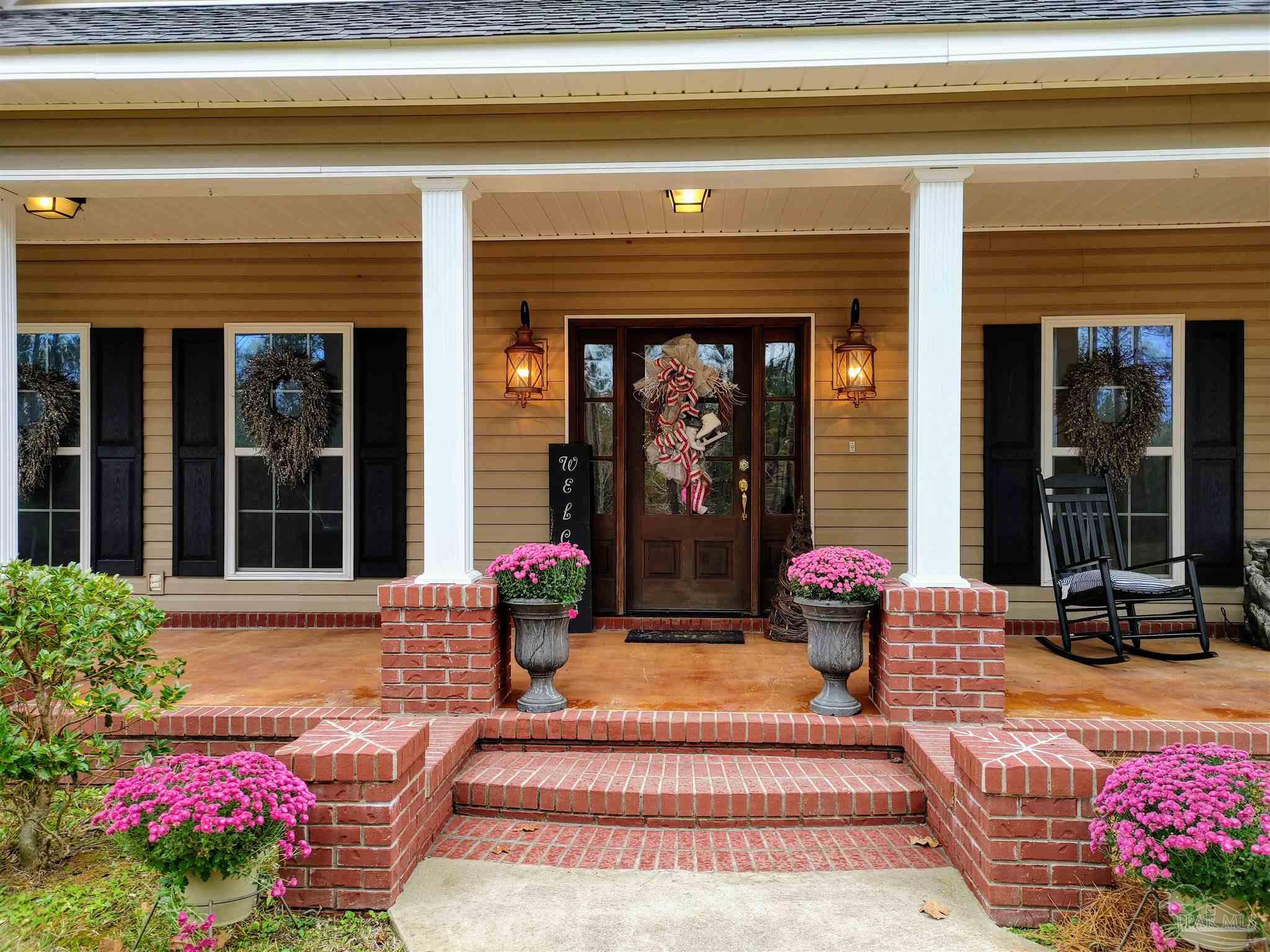 415 Clark Road Gilbertown, AL 36908 - Photo 30 of 50 a building outdoor space with patio furniture