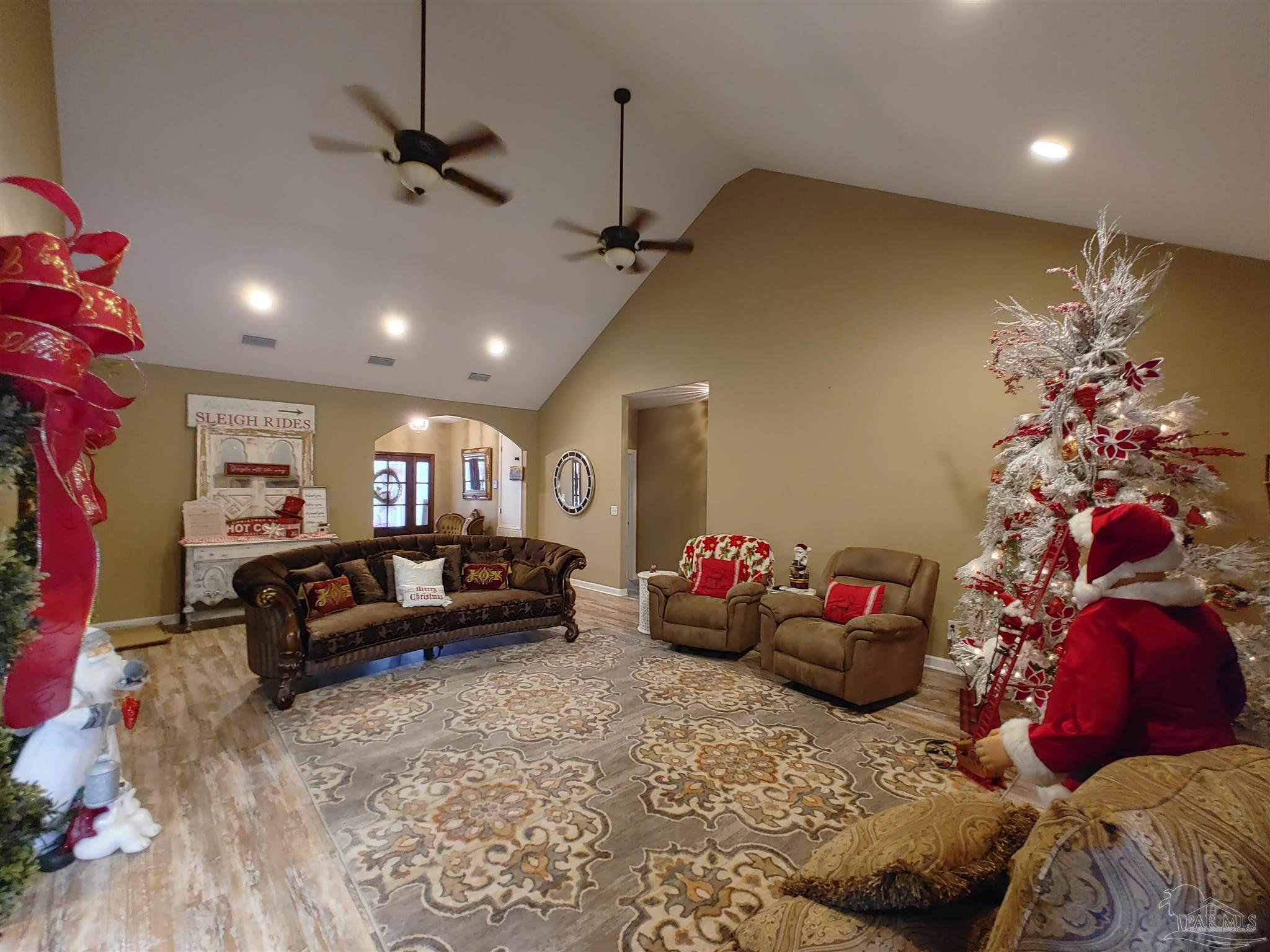 415 Clark Road Gilbertown, AL 36908 - Photo 4 of 50 a living room with furniture and flowers
