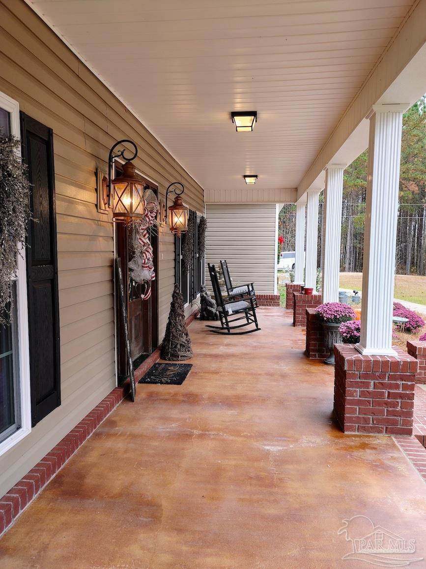 415 Clark Road Gilbertown, AL 36908 - Photo 31 of 50 a view of a livingroom with furniture and windows