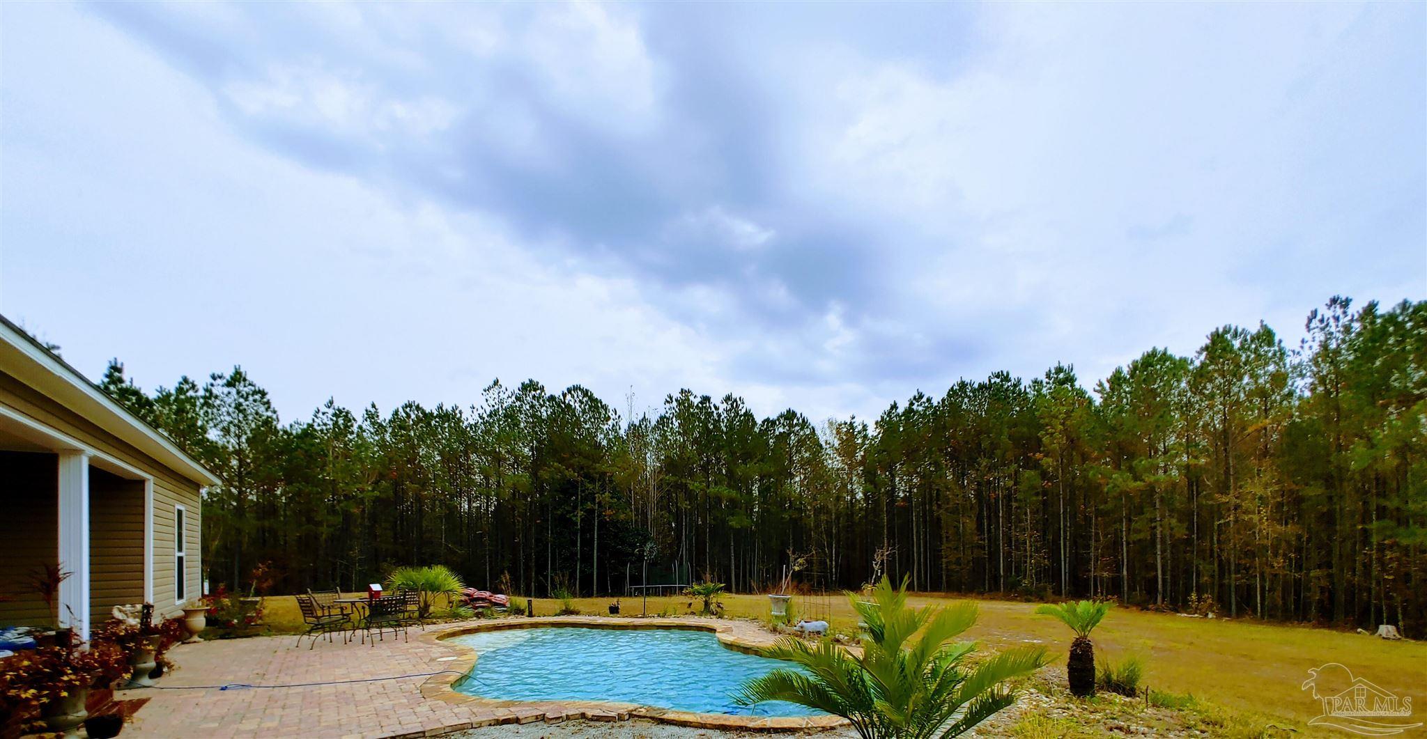 415 Clark Road Gilbertown, AL 36908 - Photo 33 of 50 a view of swimming pool with a yard