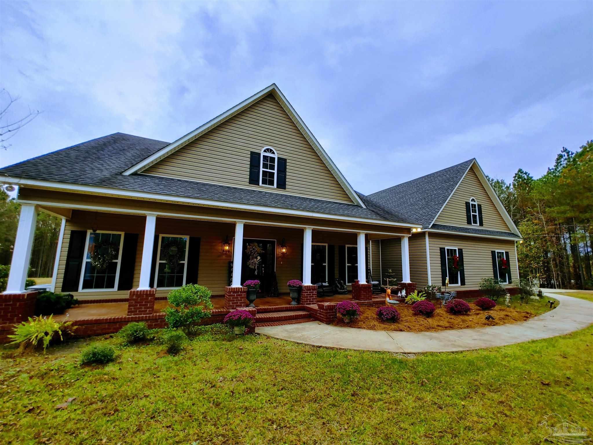415 Clark Road Gilbertown, AL 36908 - Photo 39 of 50 a view of a house with swimming pool and porch