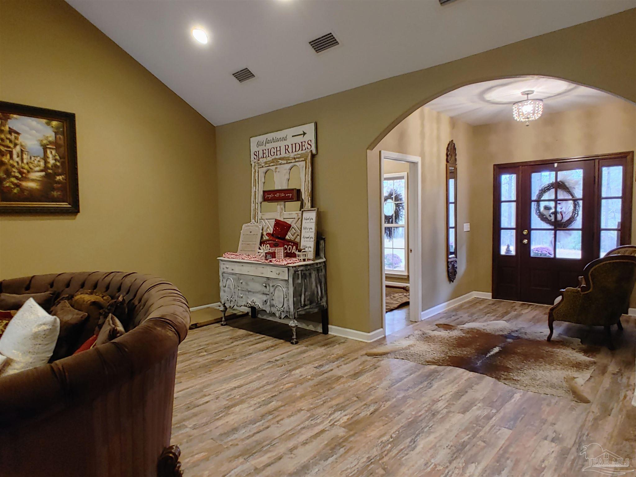 415 Clark Road Gilbertown, AL 36908 - Photo 5 of 50 a bedroom with furniture and window
