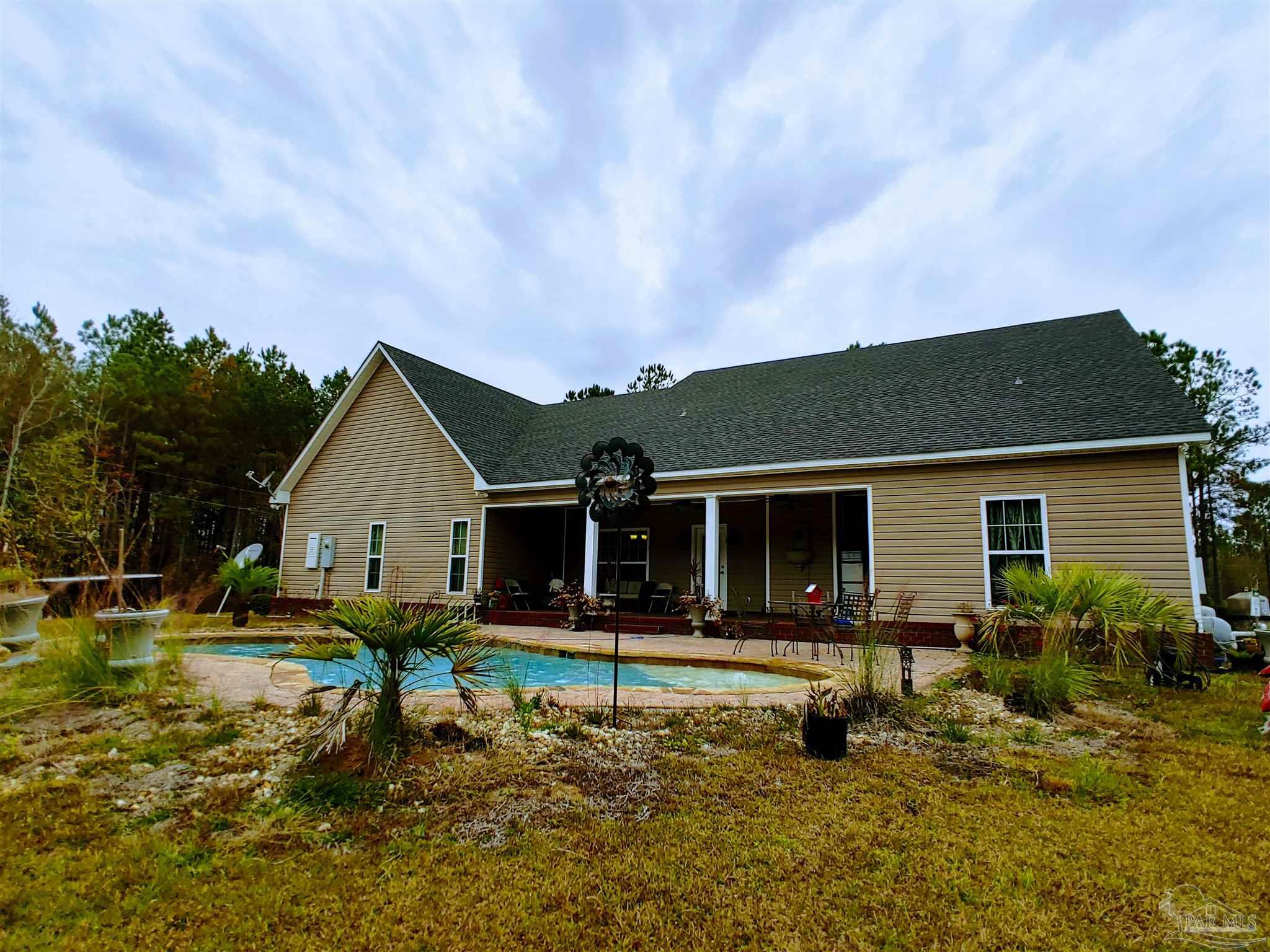 415 Clark Road Gilbertown, AL 36908 - Photo 44 of 50 a house view with a garden space