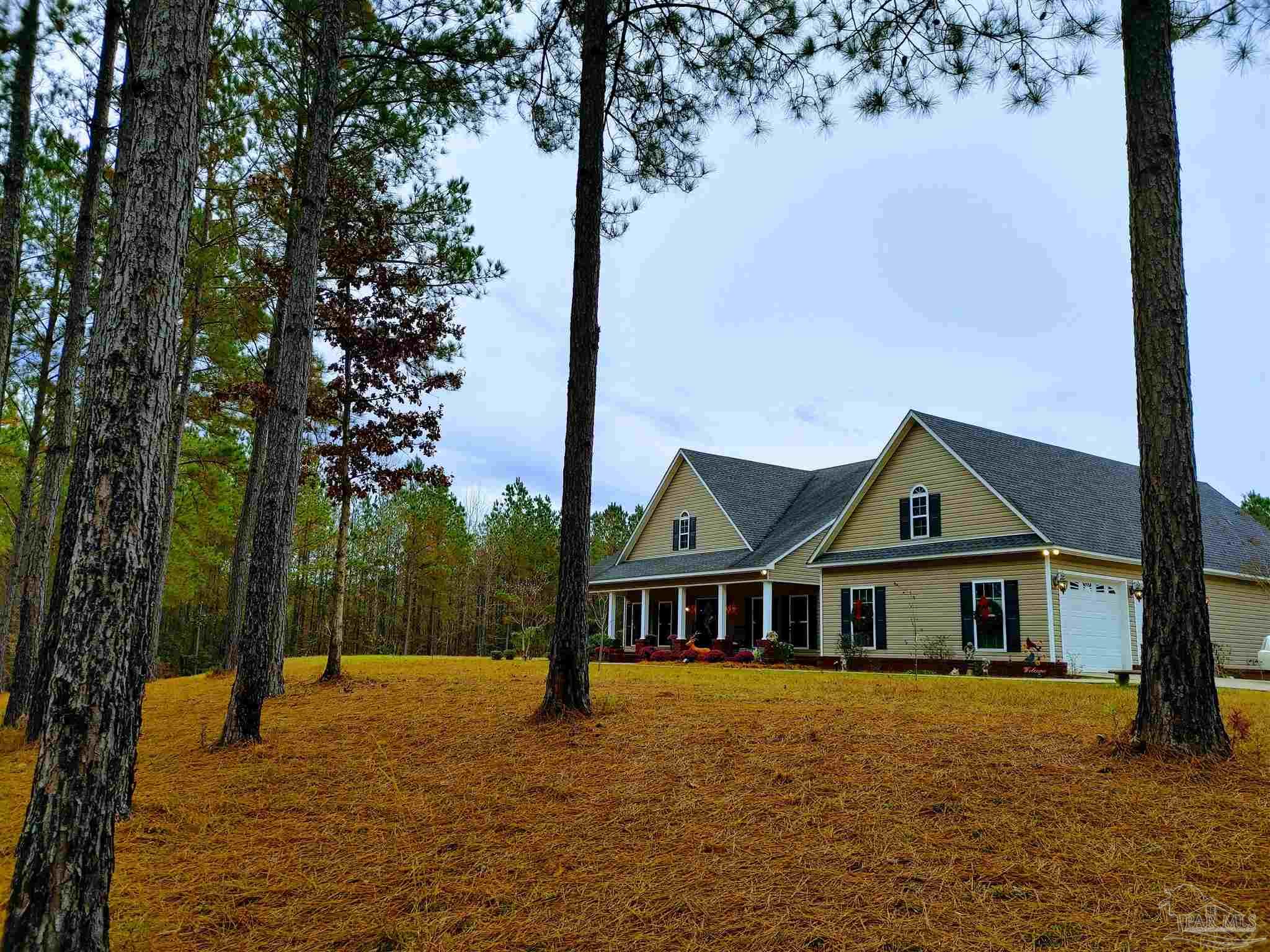 415 Clark Road Gilbertown, AL 36908 - Photo 45 of 50 a front view of a house with a yard
