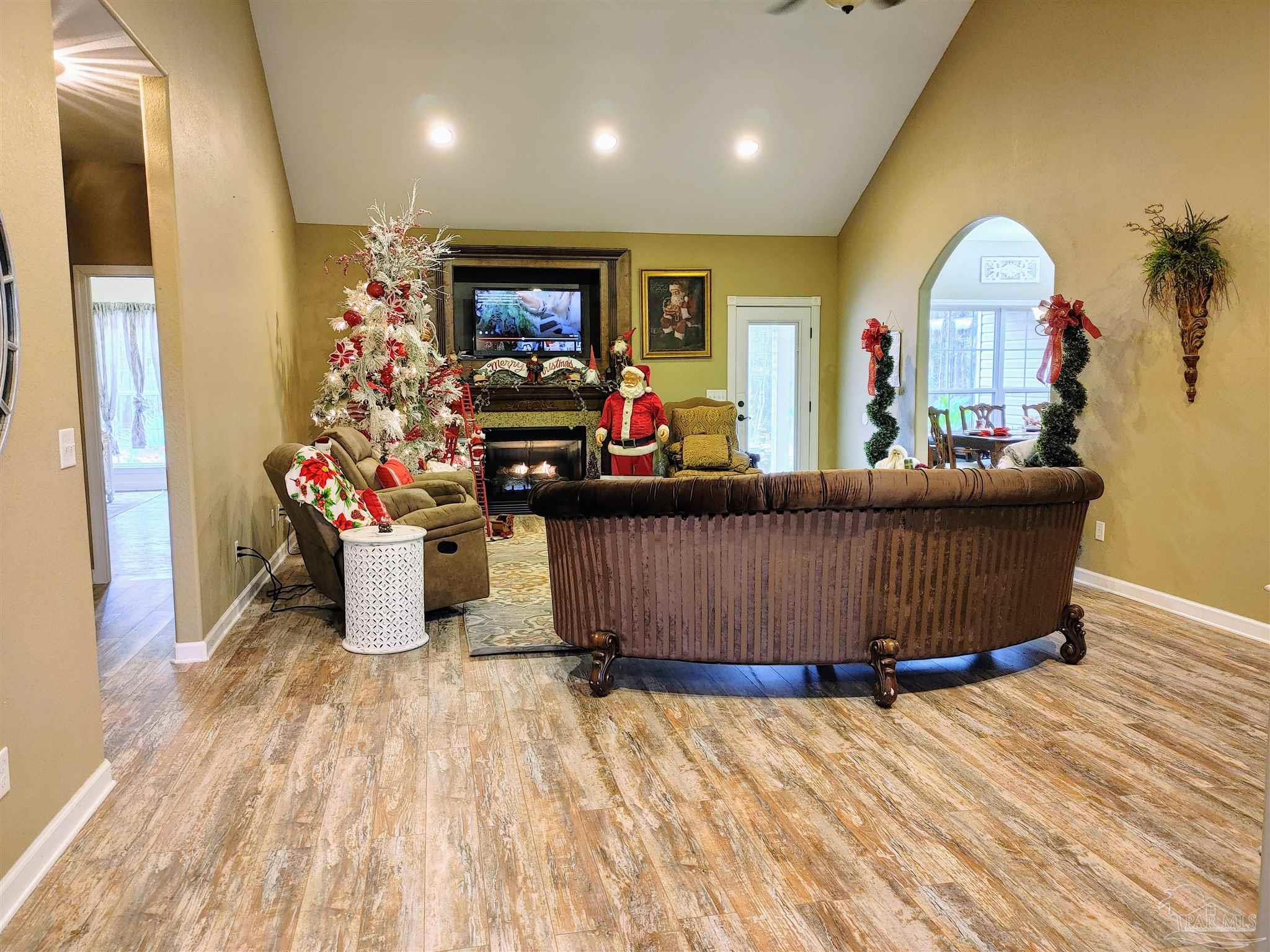 415 Clark Road Gilbertown, AL 36908 - Photo 8 of 50 a living room with furniture and a flat screen tv
