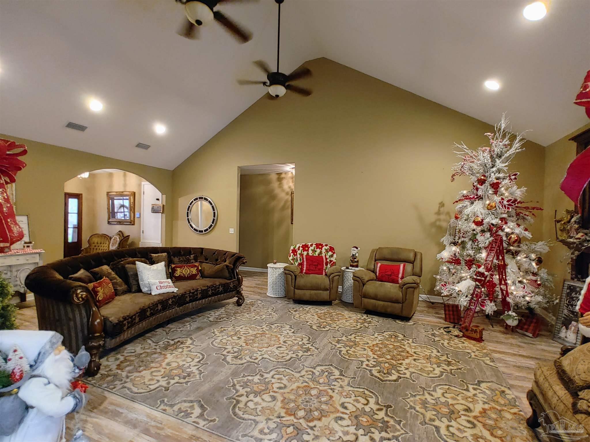 415 Clark Road Gilbertown, AL 36908 - Photo 9 of 50 a living room with furniture and a potted plant