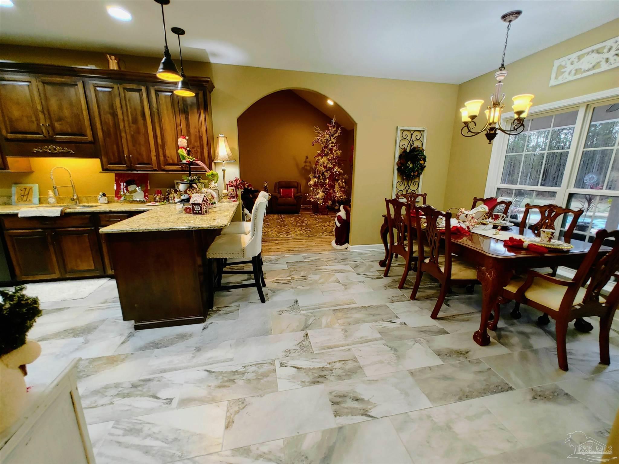 415 Clark Road Gilbertown, AL 36908 - Photo 10 of 50 a view of a dining room with furniture