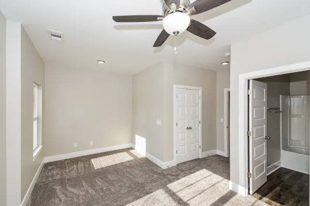 wooden floor in an empty room and a window
