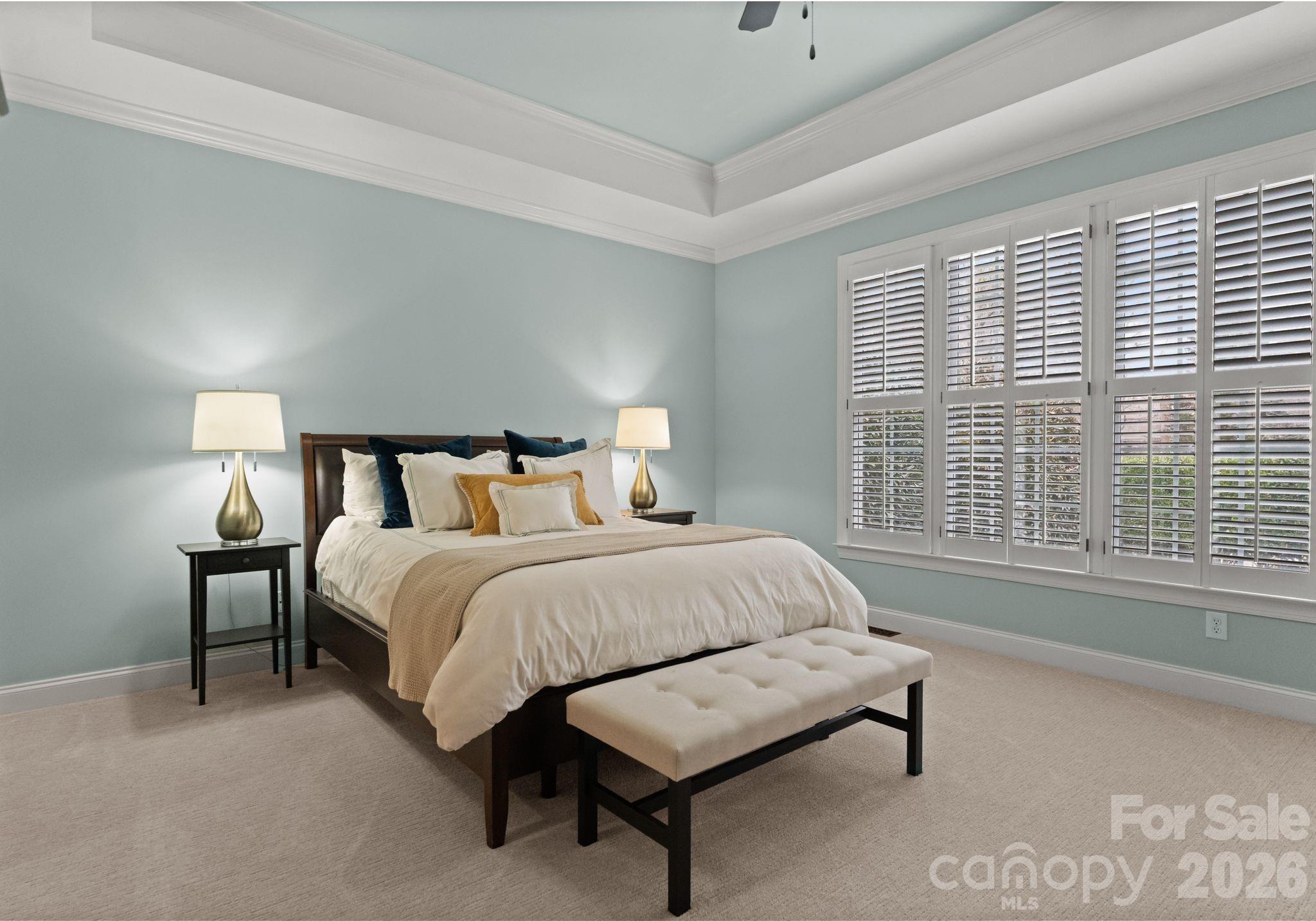 10012 Paradise Ridge Road Charlotte, NC 28277 - Photo 19 of 48 a bedroom with a bed and a night stand