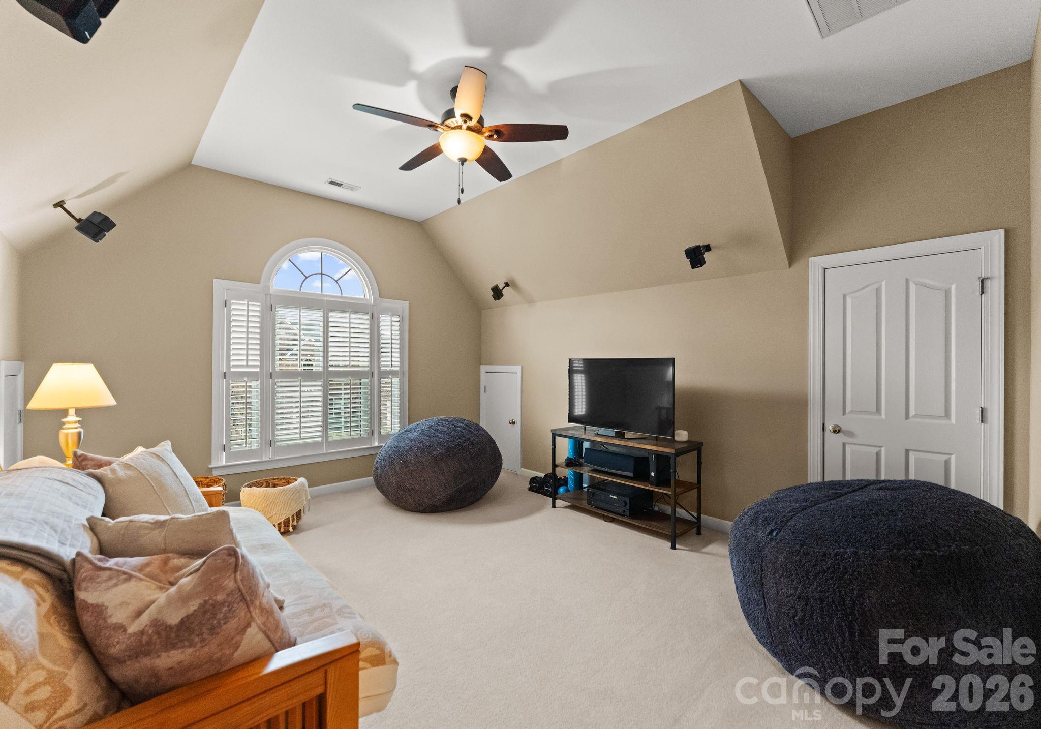 10012 Paradise Ridge Road Charlotte, NC 28277 - Photo 28 of 48 a bedroom with furniture and a window