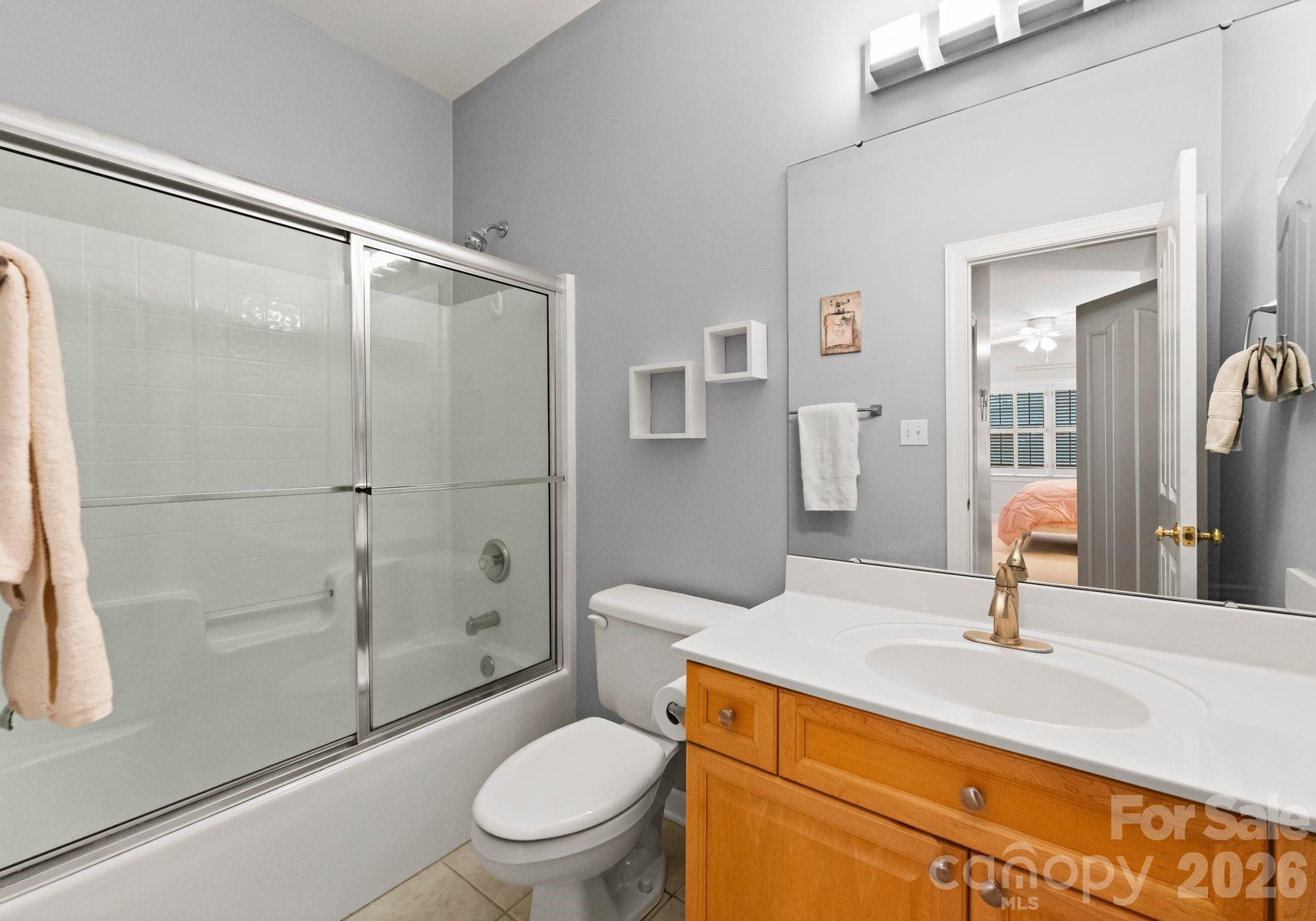 10012 Paradise Ridge Road Charlotte, NC 28277 - Photo 34 of 48 a bathroom with a sink toilet and shower