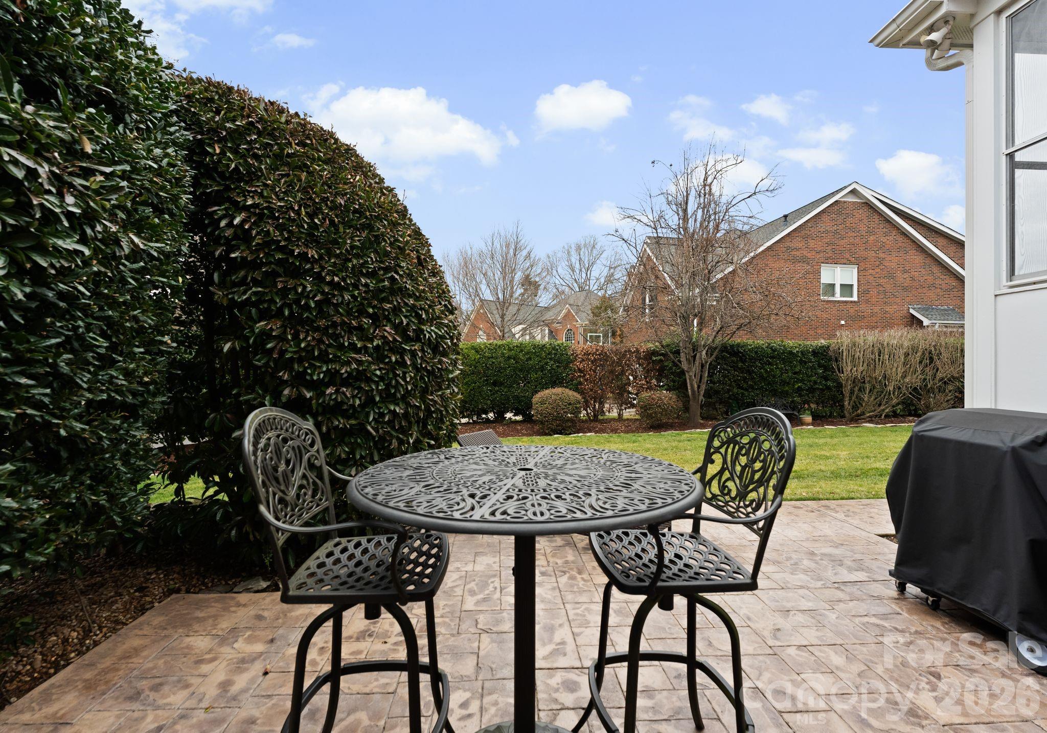 10012 Paradise Ridge Road Charlotte, NC 28277 - Photo 39 of 48 a view of a chairs and table in patio