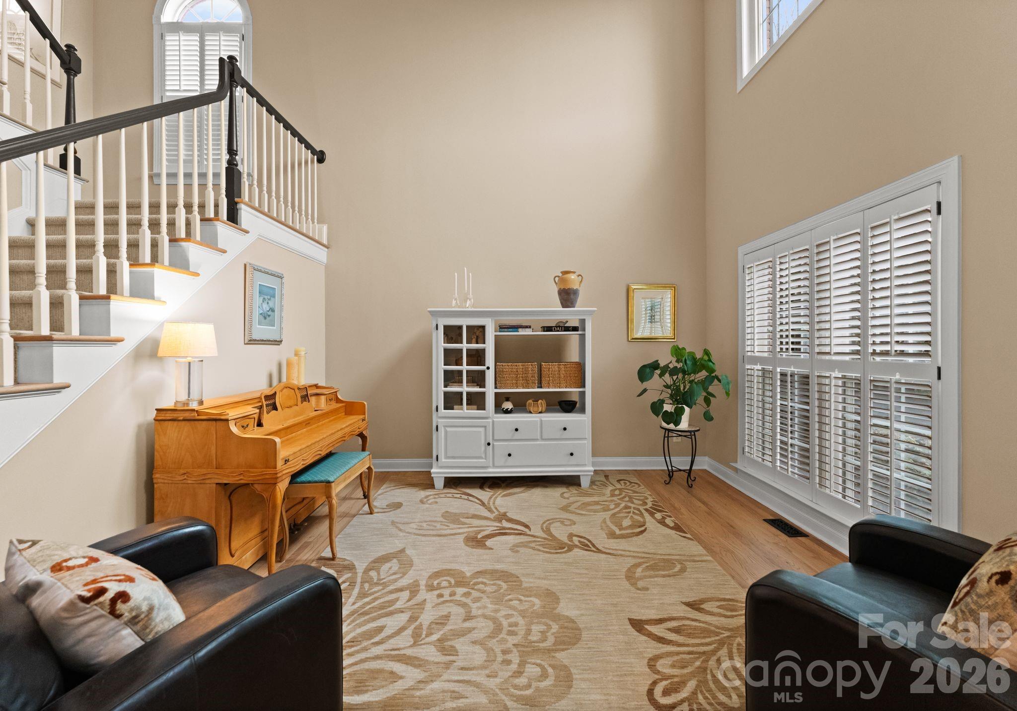 10012 Paradise Ridge Road Charlotte, NC 28277 - Photo 5 of 48 a living room with furniture and a flat screen tv