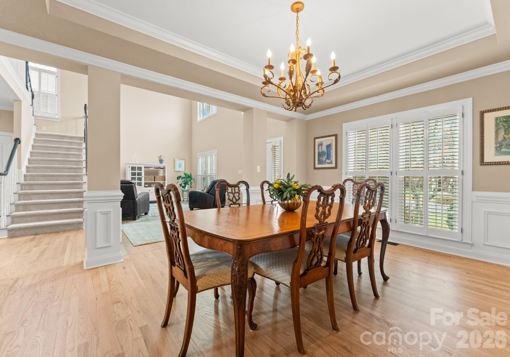10012 Paradise Ridge Road Charlotte, NC 28277 - Photo 6 of 48 a view of a dining room with furniture window and wooden floor