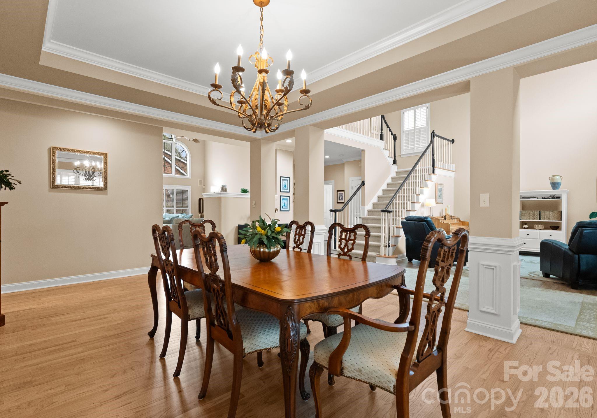 10012 Paradise Ridge Road Charlotte, NC 28277 - Photo 8 of 48 a view of a dining room with furniture window and wooden floor