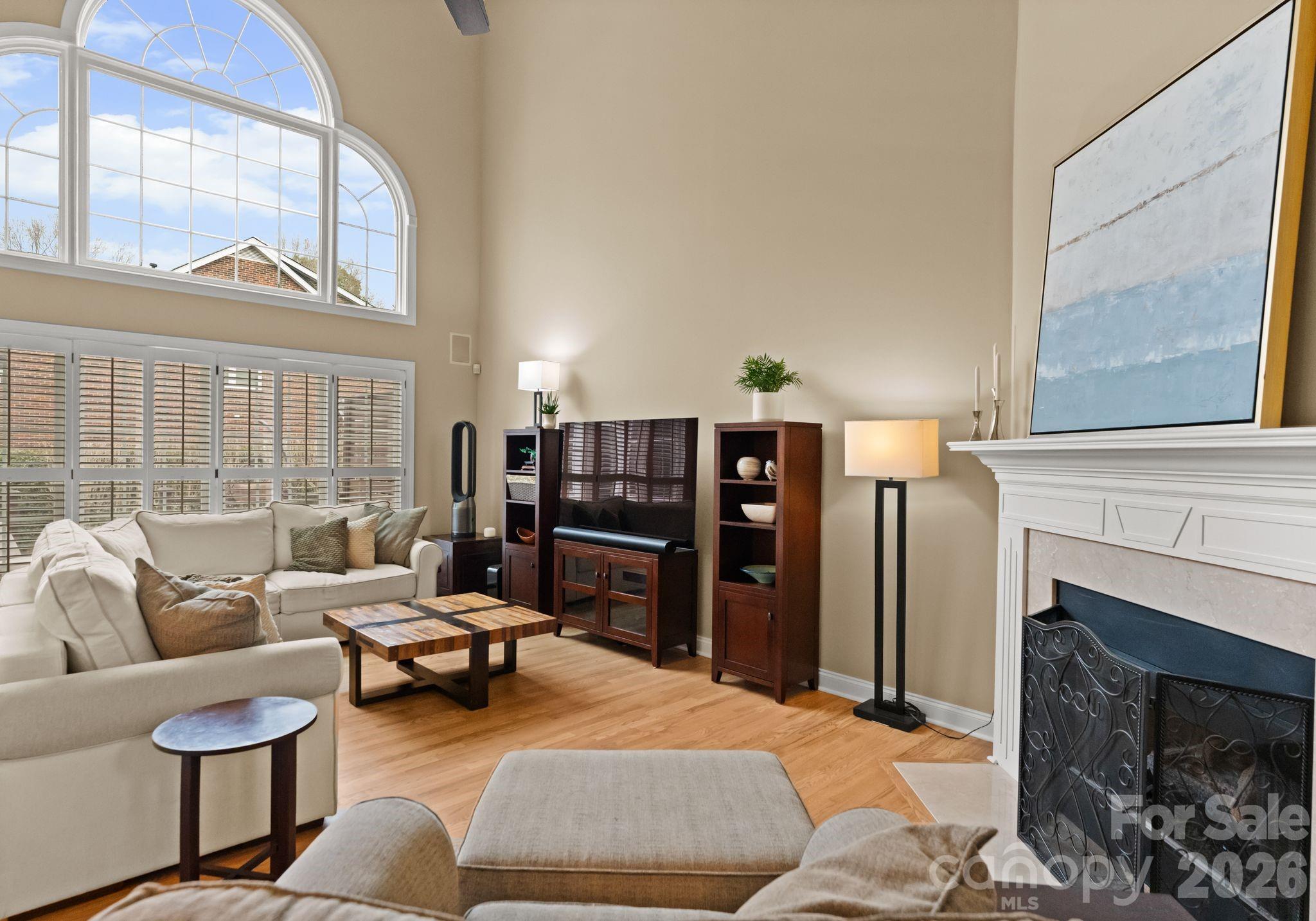 10012 Paradise Ridge Road Charlotte, NC 28277 - Photo 9 of 48 a bedroom with furniture and a fireplace