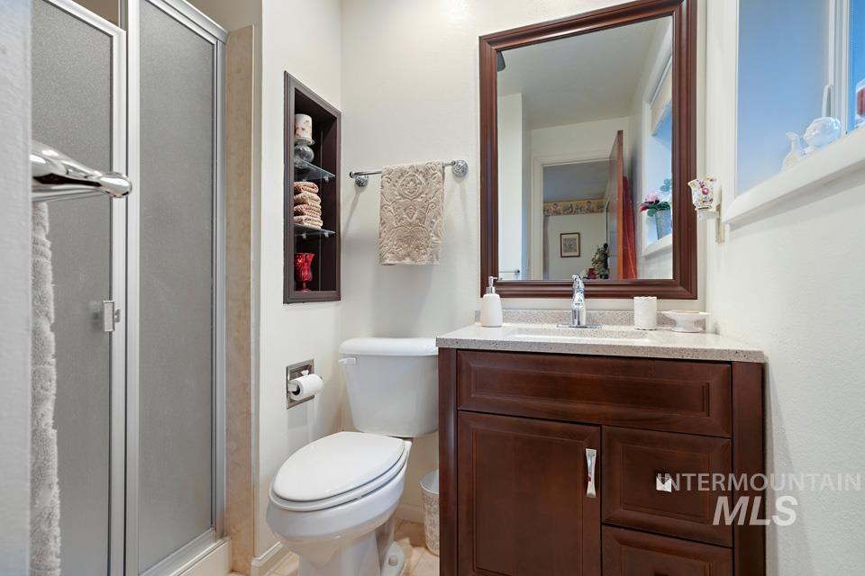 9518 Scorpio Street Boise, ID 83709 - Photo 20 of 46 Full bath featuring a shower stall and vanity