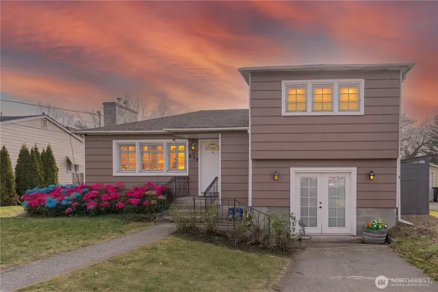a front view of a house with yard