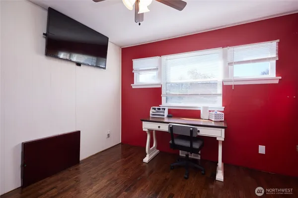 a room with furniture and a flat screen tv