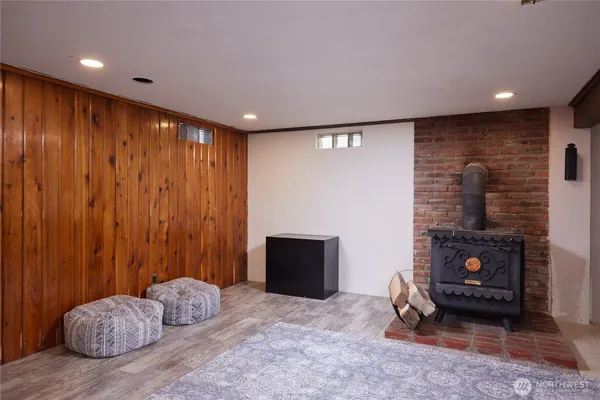 a spacious bedroom with a bed and a fireplace
